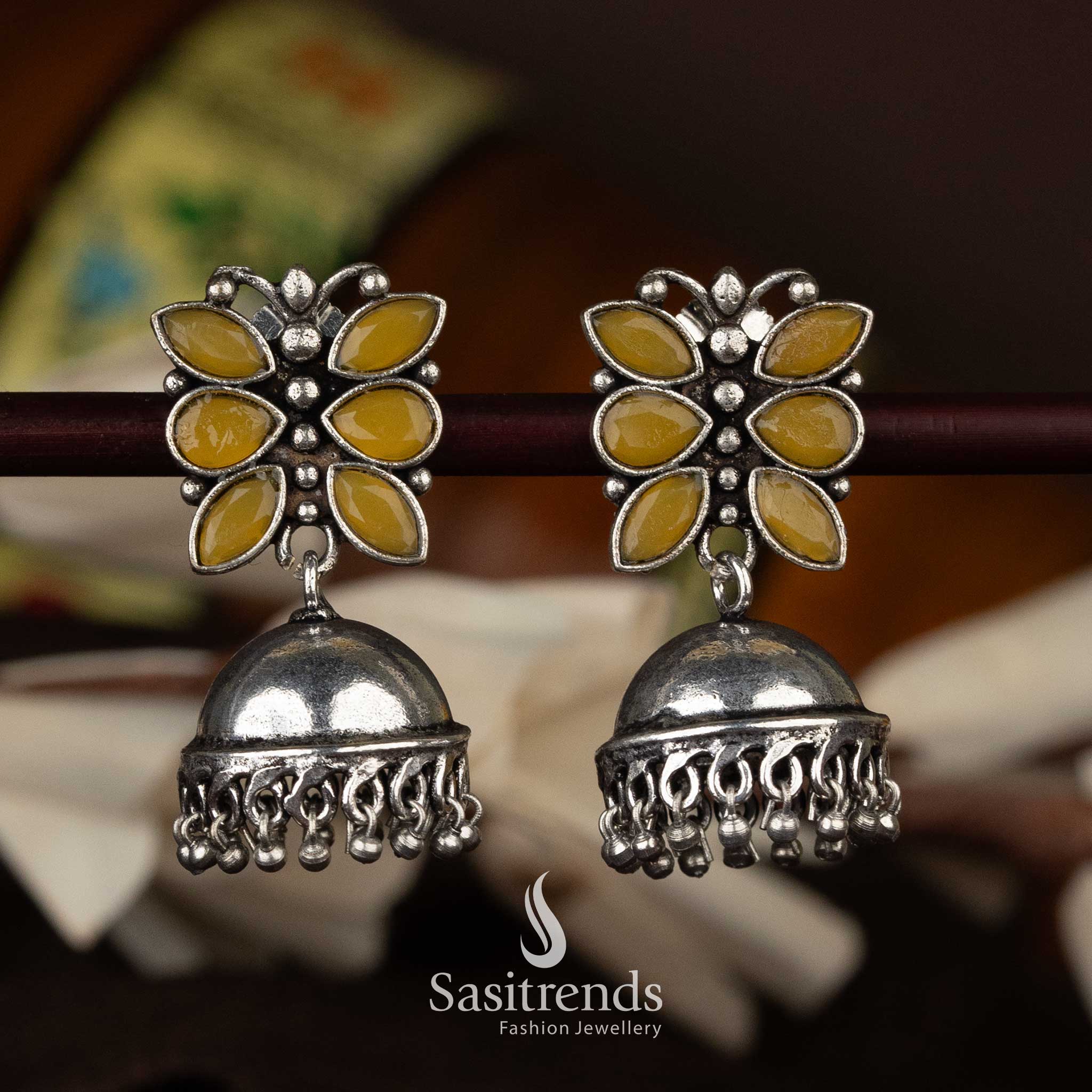 Oxidised jhumka earrings with a vibrant yellow flower top and intricate beads - Sasitrends