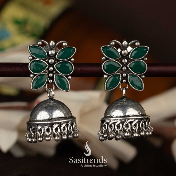 Green oxidised silver jhumka earrings with intricate floral detailing and dome - Sasitrends