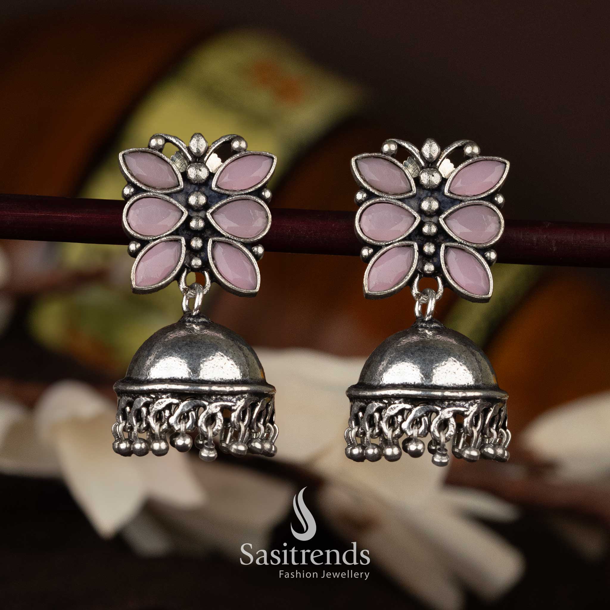 Elegant pink oxidised jhumka earrings with dome design and floral accents - Sasitrends