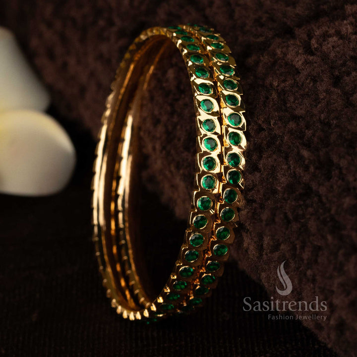 Magnificent Traditional Wear Impon Micro Gold Plated Bangles with American Diamond Stones, adorned with vibrant Green Stones - Sasitrends