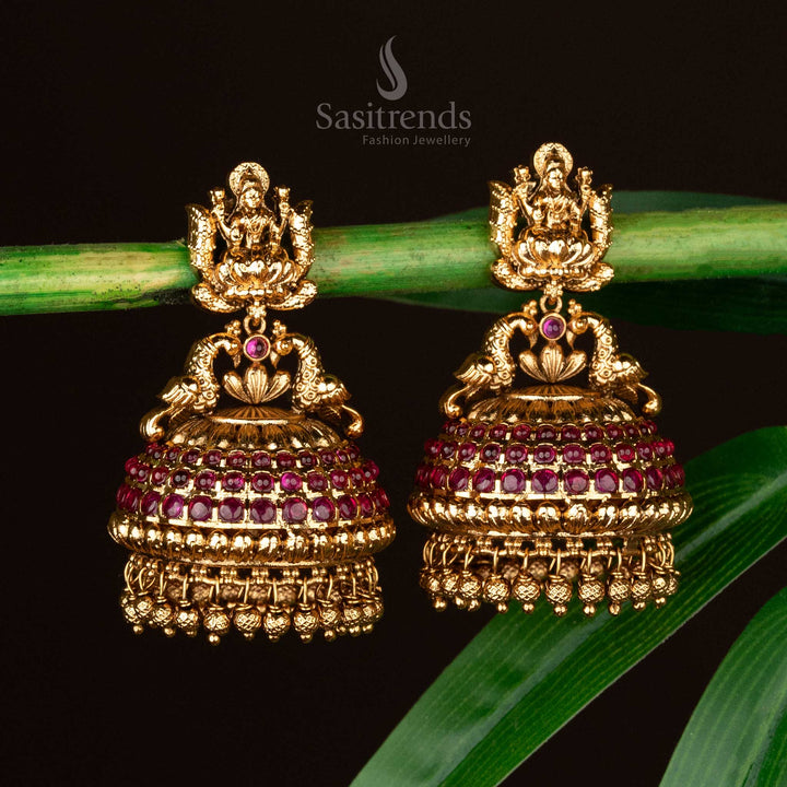 Sasitrends - Attractive Premium Temple Matte Gold-Plated Peacock and Lakshmi Big Bridal Jhumka Earrings