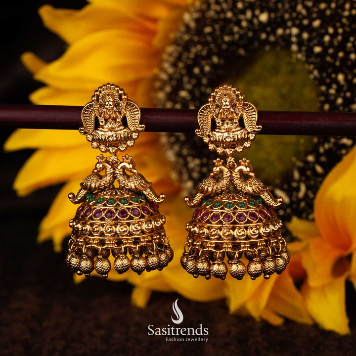 Temple bridal jhumka earrings with Lakshmi and peacock design in Ruby-Green - Sasitrends





