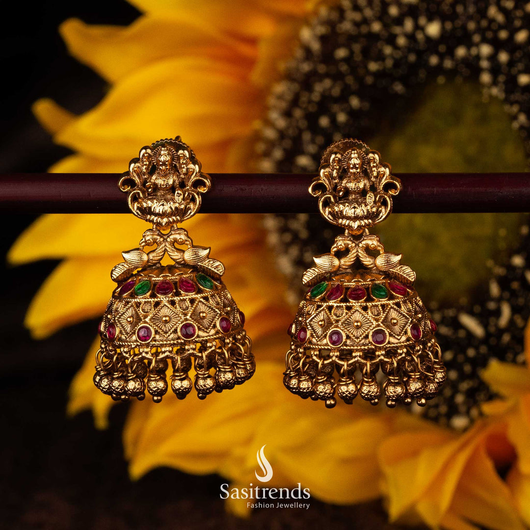 Temple jhumka earrings with Lakshmi, ruby, and green stones - Sasitrends





