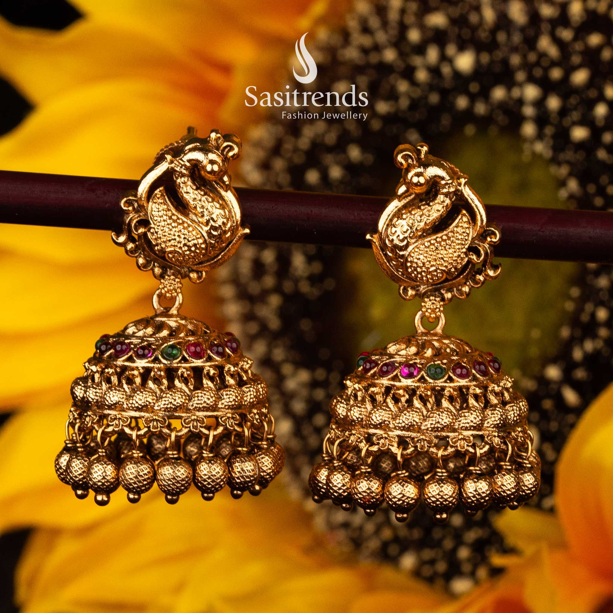 Traditional ruby-green jhumka earrings for weddings and festive occasions - Sasitrends