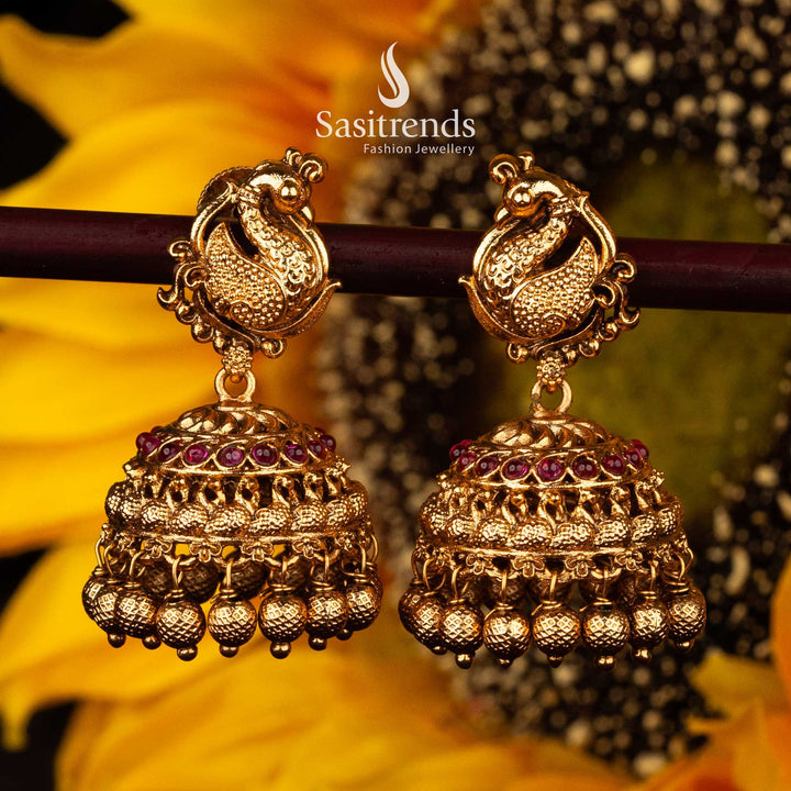 South Indian ruby temple earrings with intricate dome and ball hangings - Sasitrends