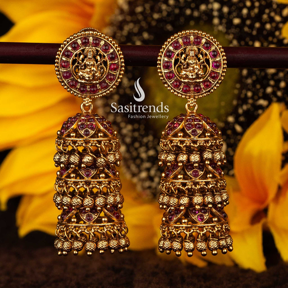 Traditional ruby temple earrings with Lakshmi motif and floral patterns - Sasitrends