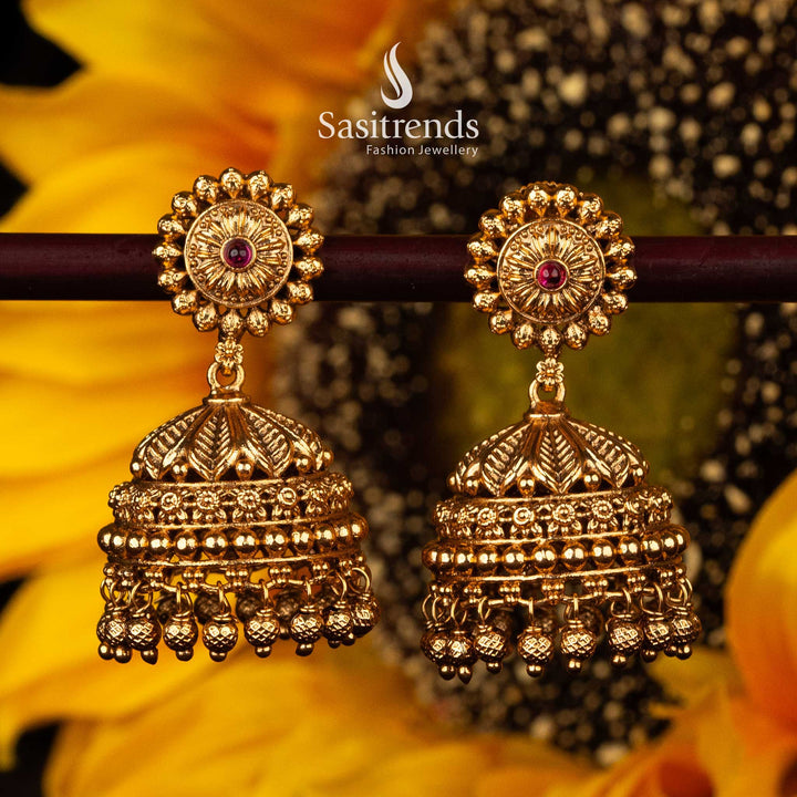 Traditional temple jhumka earrings with floral top and ruby stone - Sasitrends