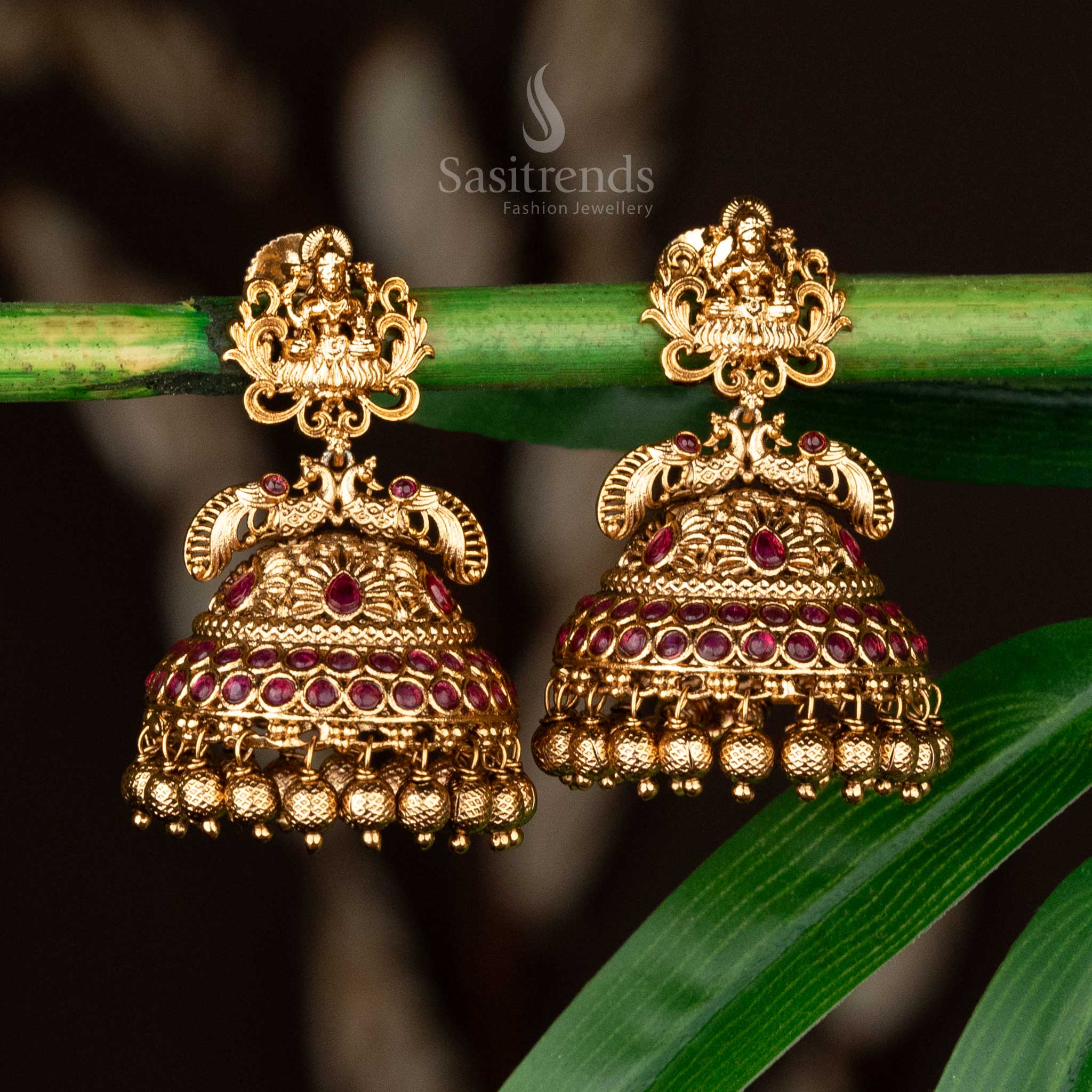 Traditional ruby earrings in matte gold with temple motifs and dangling beads - Sasitrends