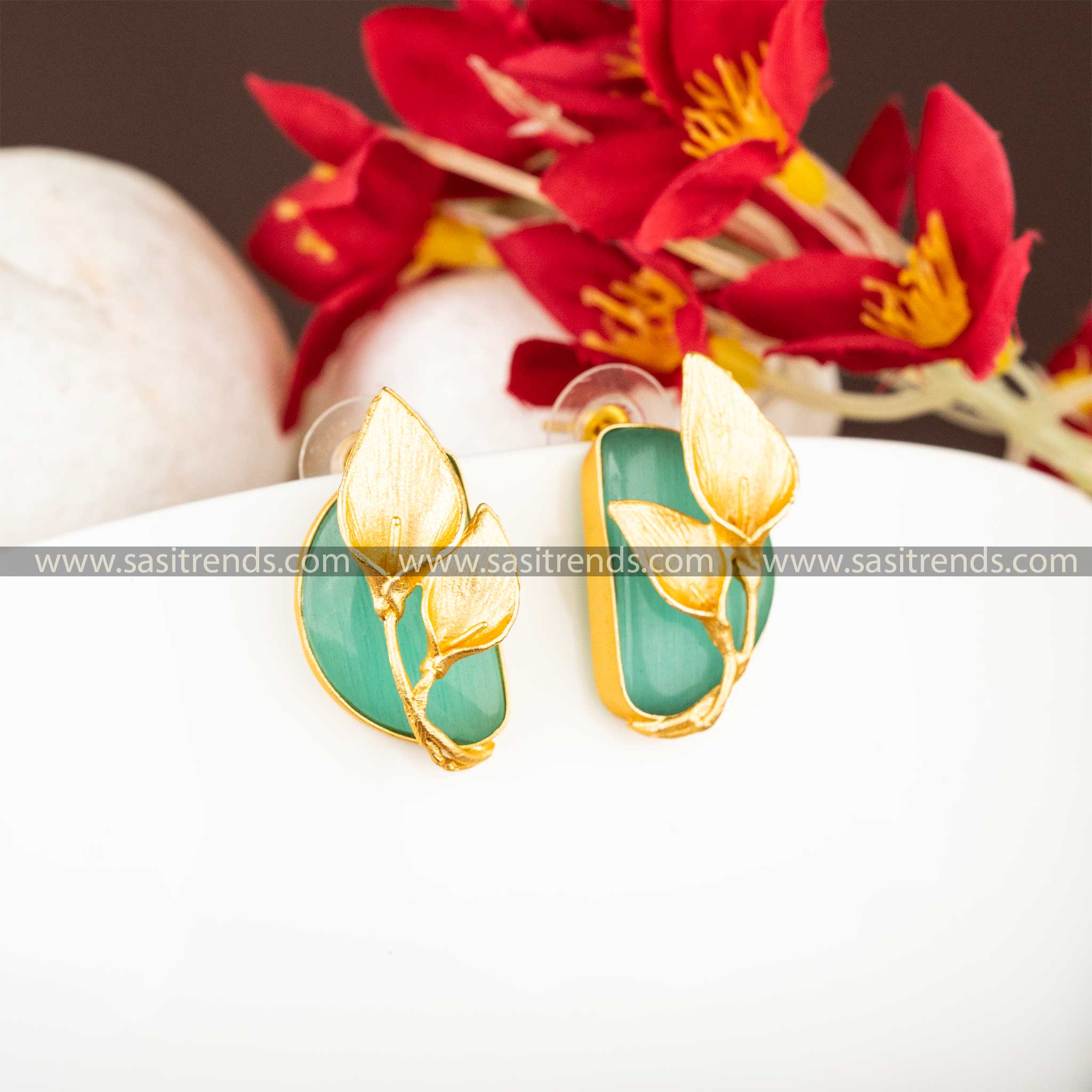 Trendy Gold Plated Push Back Leaf Pattern Mint Stone Studded Earrings