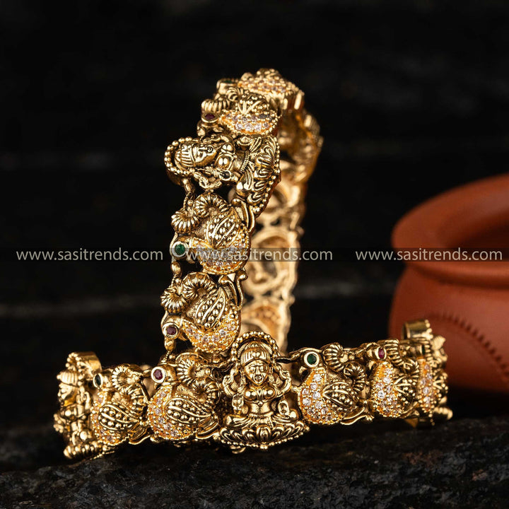 Sasitrends - Swan and Lakshmi Adorned Temple Matte Gold Plated Bridal Bangles