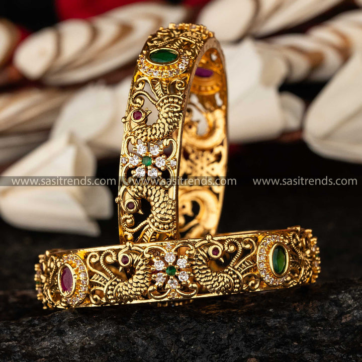 Sasitrends - Enchanting Peacock Matte Gold AD Stone Bangles for Bridal and Temple Occasions