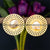 Sunburst stud earrings featuring Mother of Pearl center and radiant gold rays