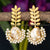 Leafy branch gold earrings with a cascade of pearls and Mother of Pearl drop