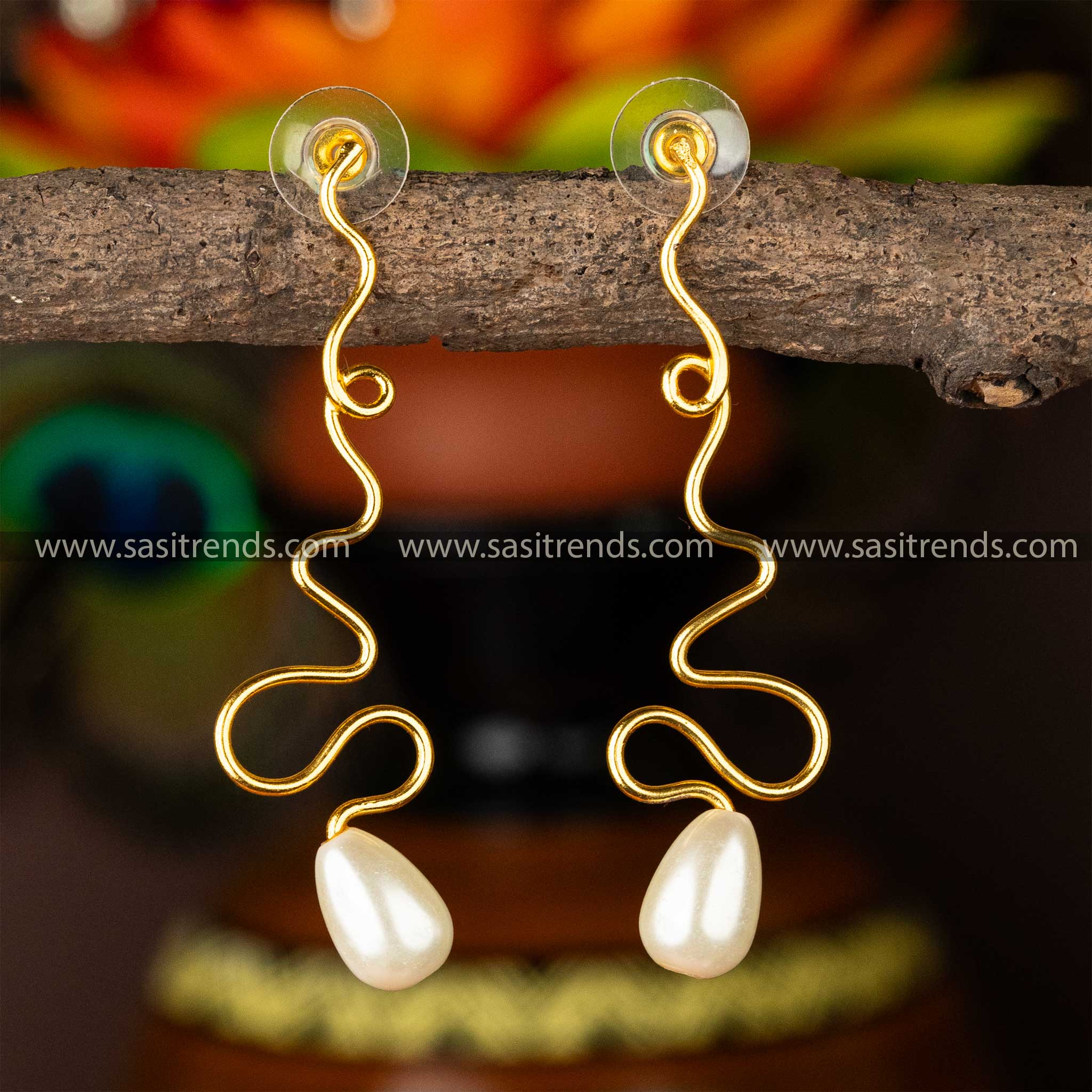 Gold-plated spiral dangle earrings with pearls