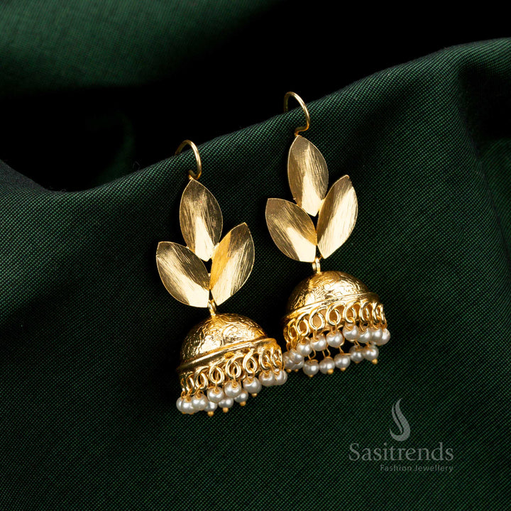 Ethereal gold-plated jhumka earrings adorned with shimmering pearl drops and an elegant leaf motif, exuding vintage - Sasitrends