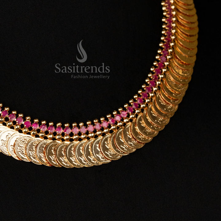 Divine micro gold-plated long necklace with intricately carved Lakshmi coins, adorned with ruby American diamonds, making it an ideal temple jewellery set for saree ensembles - Sasitrends