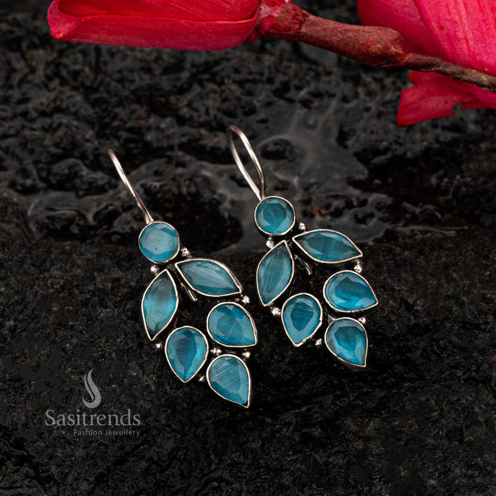 Sky blue oxidised earrings with marquise and teardrop stones, arranged in an elegant leaf pattern - Sasitrends