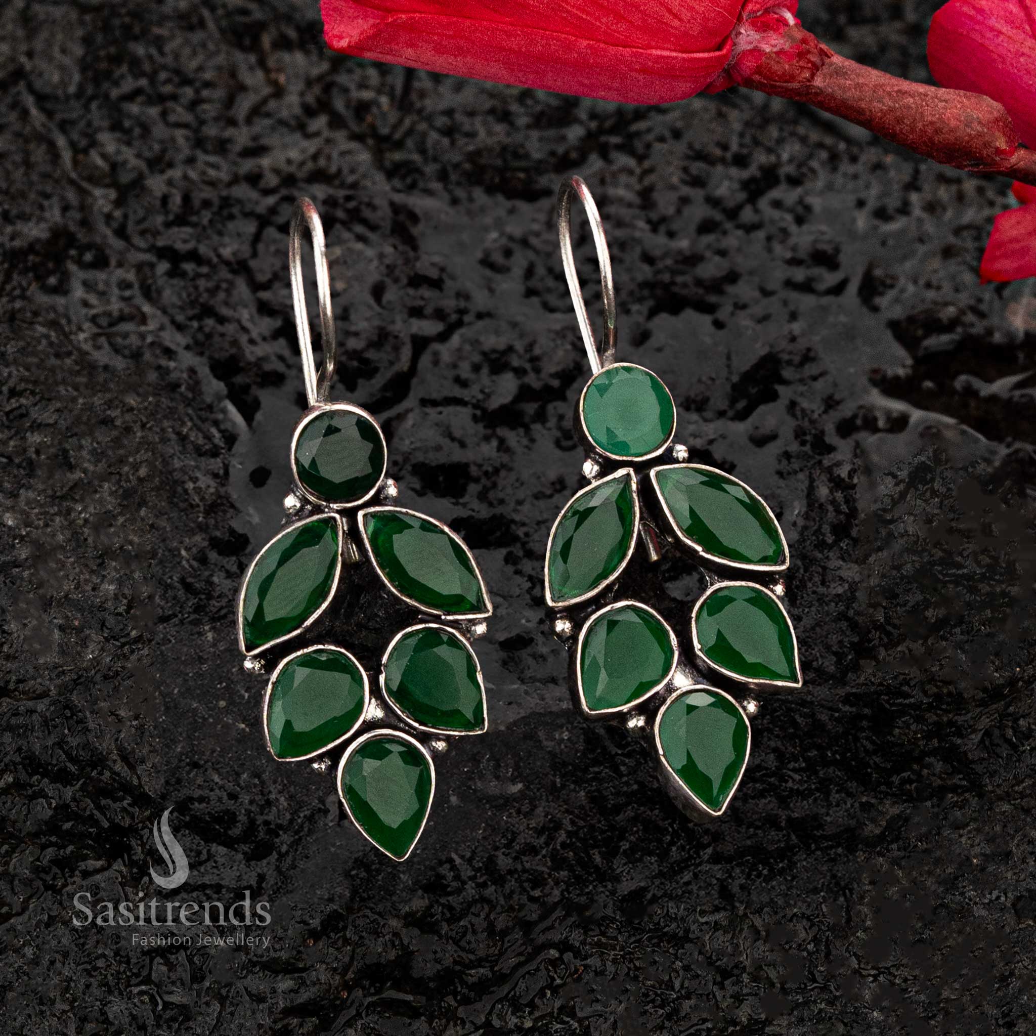 Deep green oxidised earrings featuring teardrop and marquise stones in a cascading leaf pattern - Sasitrends