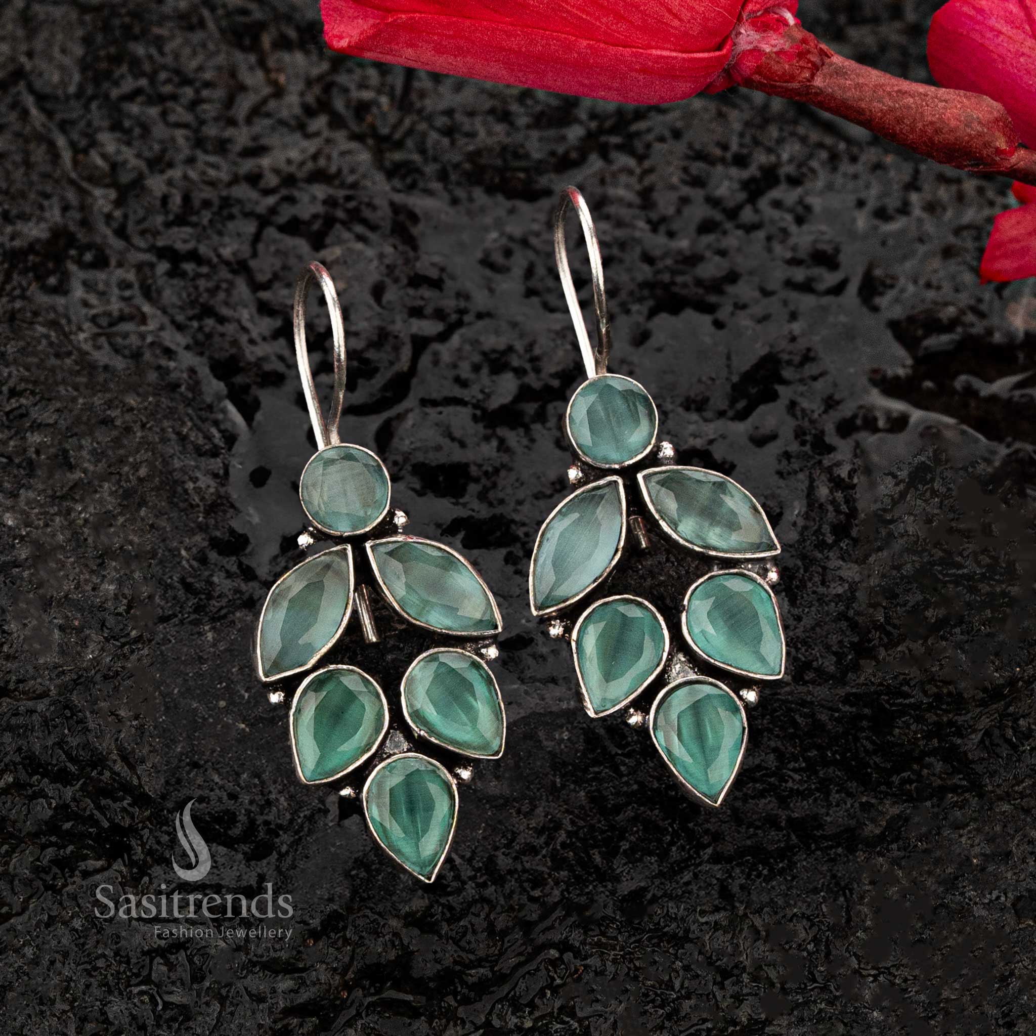 Mint stone oxidised earrings with cascading teardrop and marquise shapes in a nature-inspired leaf design - Sasitrends