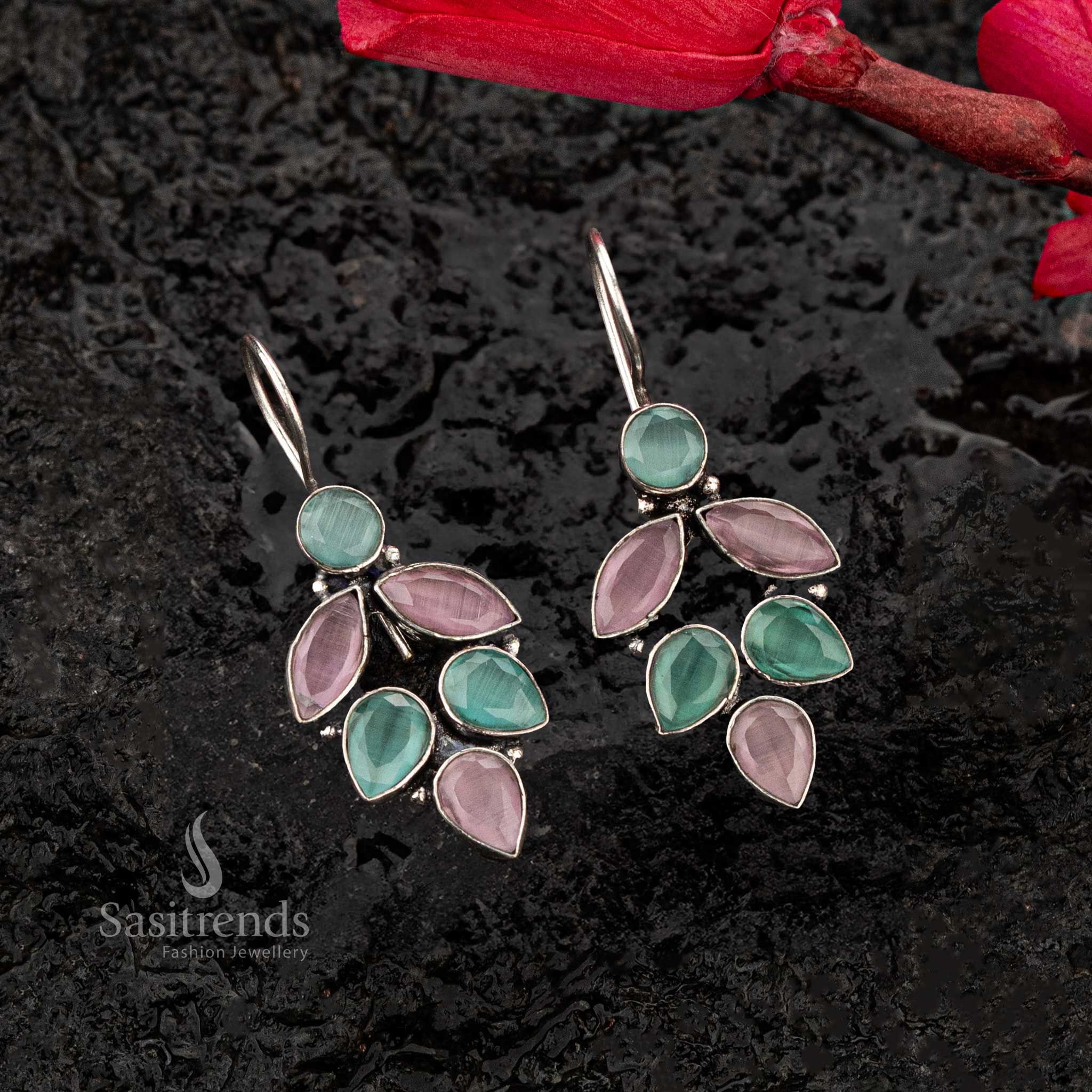 Oxidised earrings with pink mint stones in leaf-inspired teardrop and marquise shapes, perfect for a vibrant look - Sasitrends