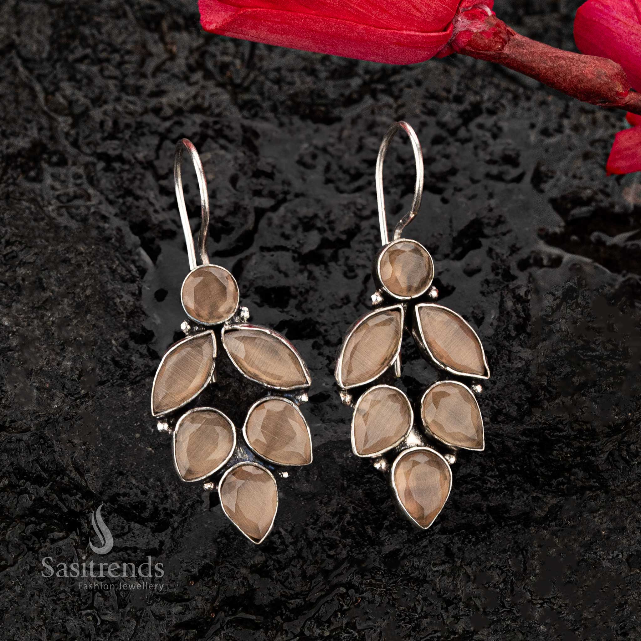 Brown oxidised earrings with leaf pattern teardrop and marquise stones, adding vibrant elegance - Sasitrends