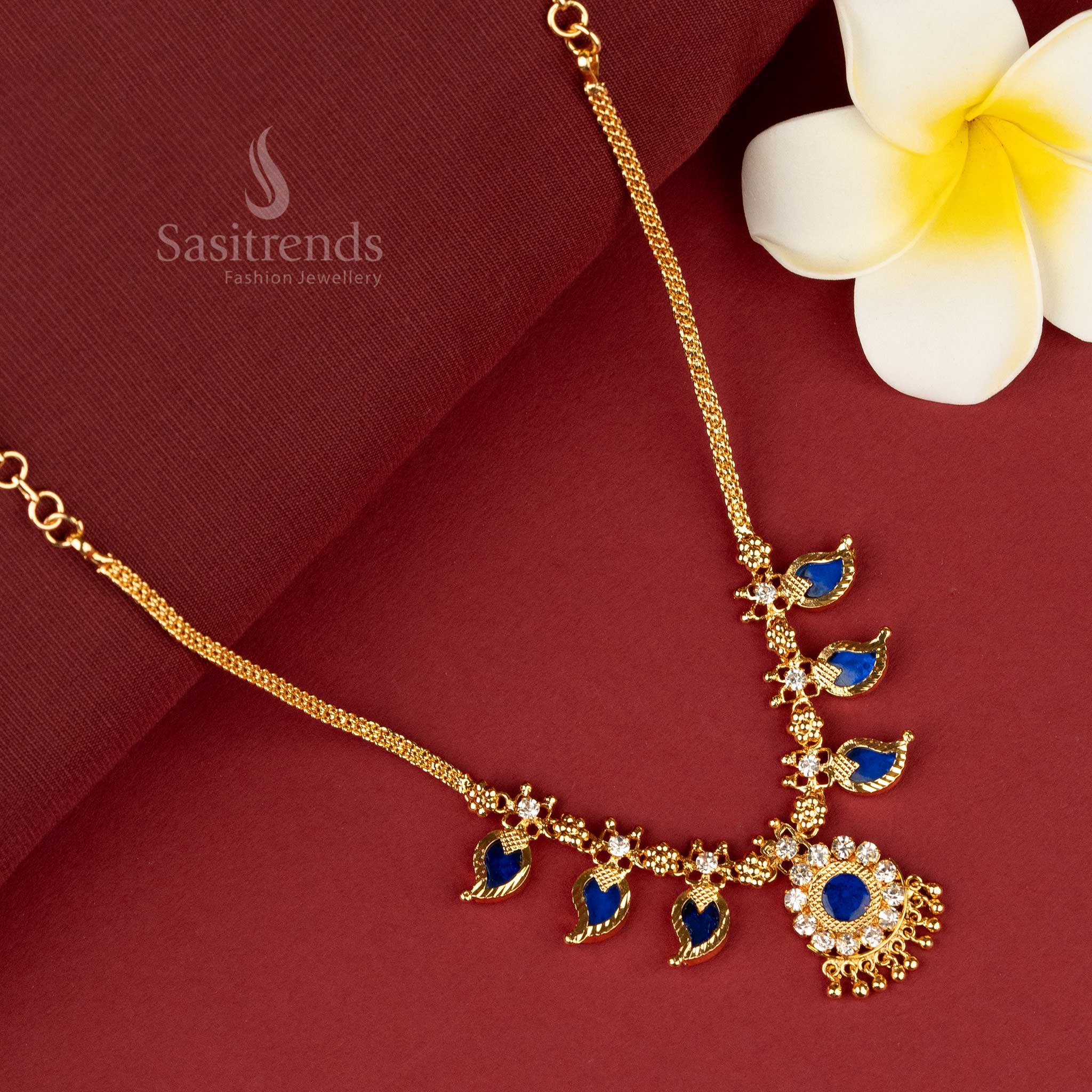 Artistic necklace featuring three blue palakka petals with mango motifs - Sasitrends