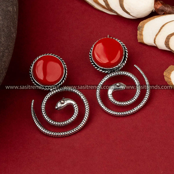 Coiled Snake Earrings with Red Monalisa Stone Against Oxidised Silver