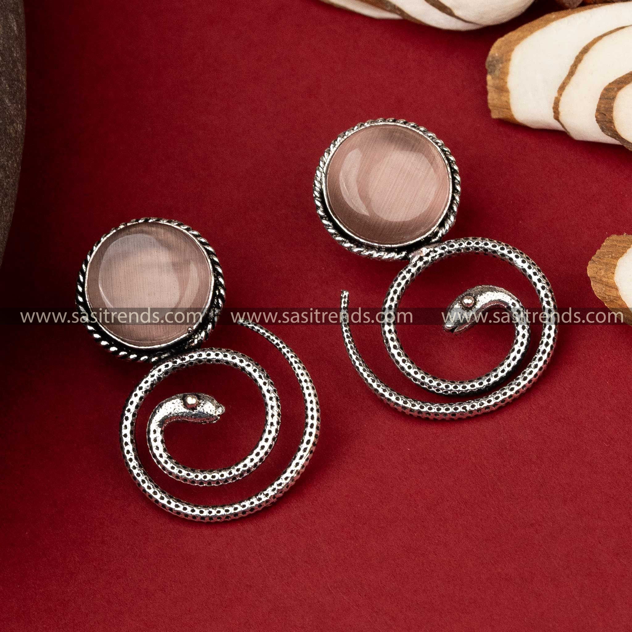 Pink Monalisa stone set in coiled snake oxidised earrings