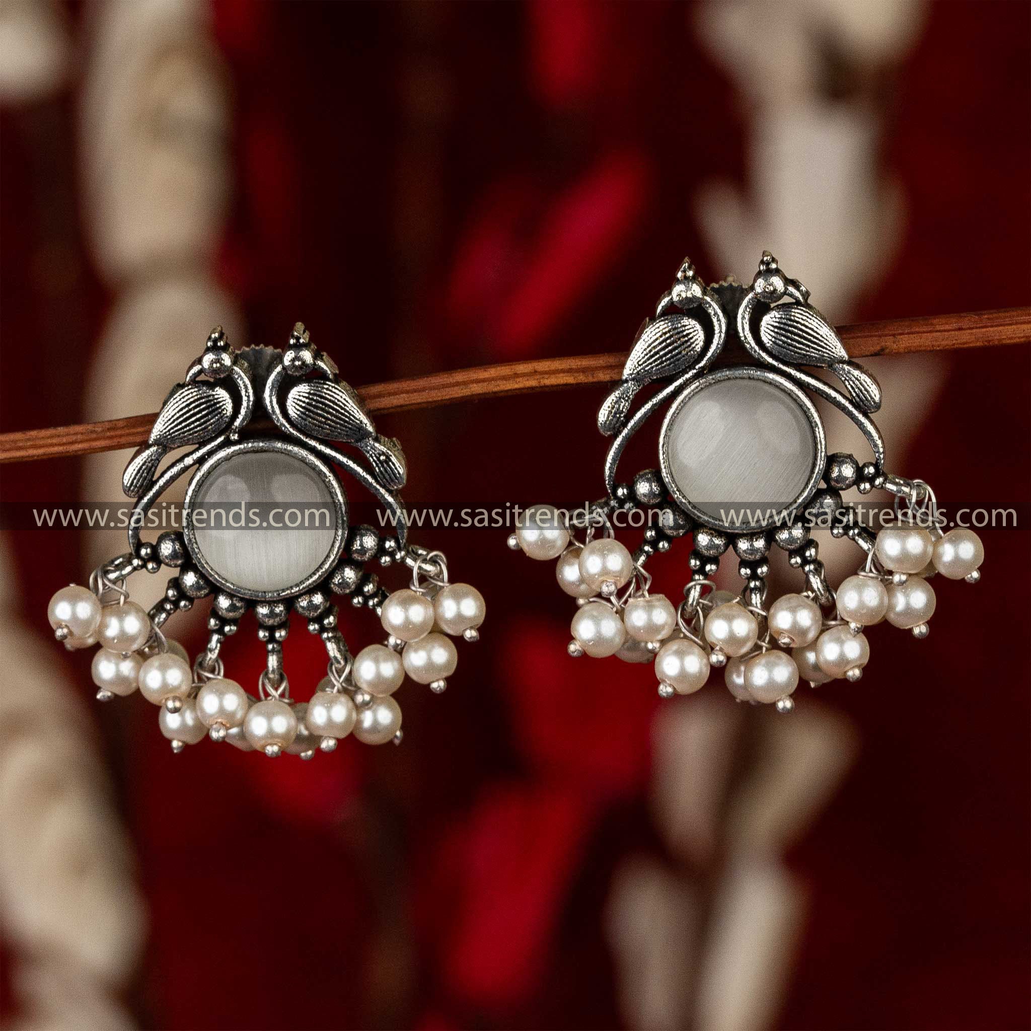 Oxidised peacock earrings with a smoky quartz centerpiece, adorned with a cascade of pearls