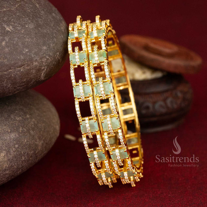 Glorious micro gold plated American diamond bangles with bold geometric design and intricate square patterns in an elegant white and mint tone, perfect for sophisticated jewellery - Sasitrends