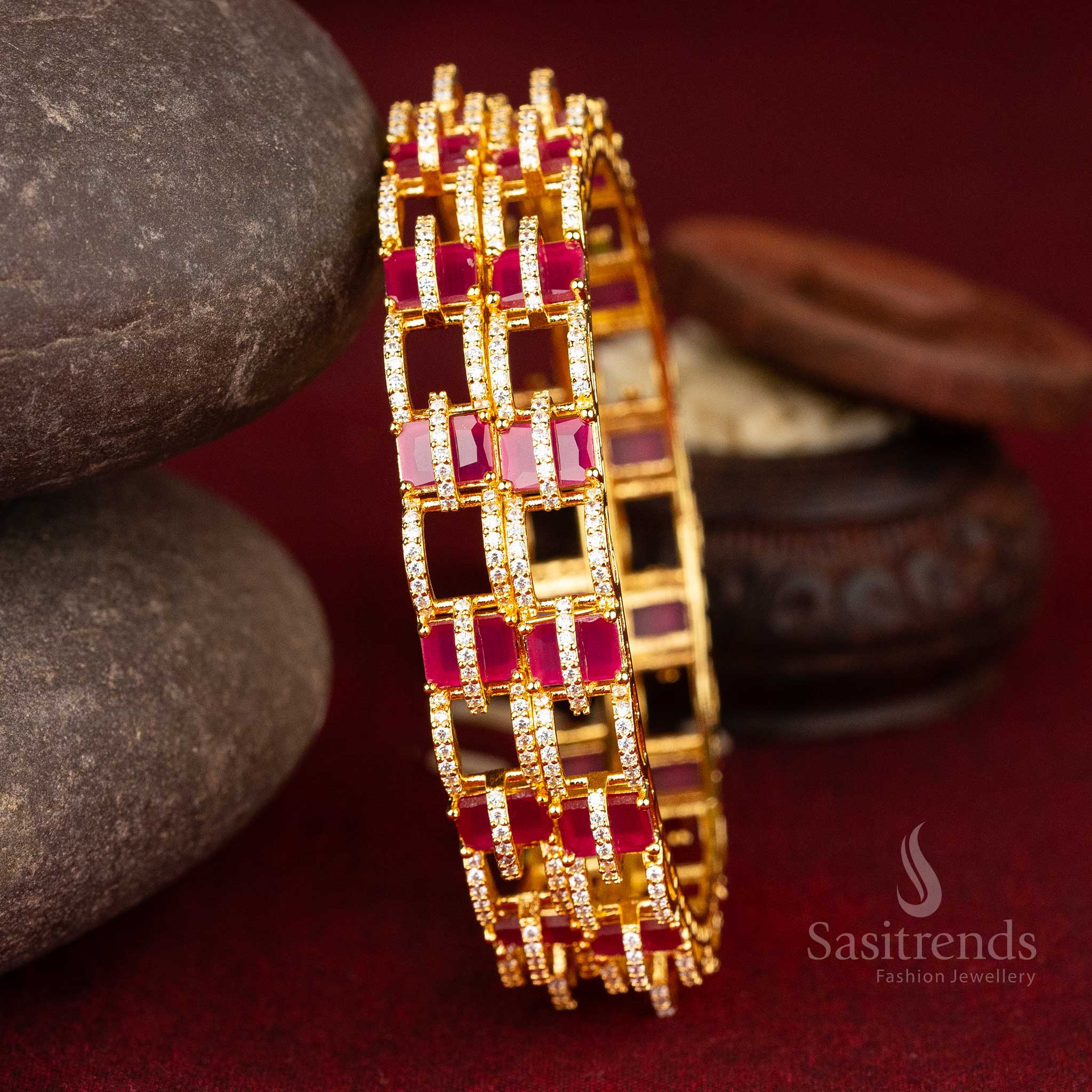 Lustrous micro gold plated American diamond bangles featuring bold geometric design and intricate square patterns in a stunning white and ruby colour combination for exquisite jewellery - Sasitrends