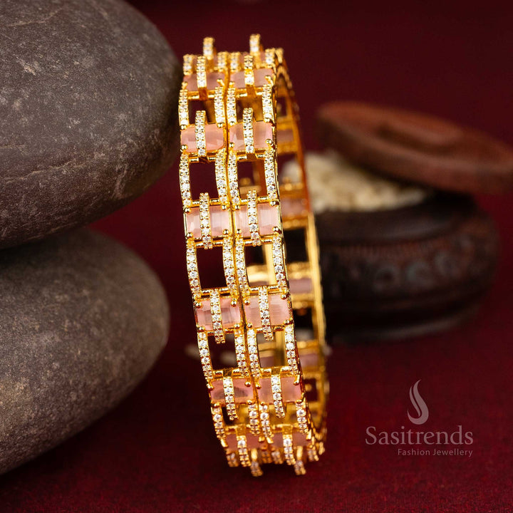 Micro gold plated American diamond bangles showcasing bold geometric design and intricate square patterns in a delightful white and pink hue for charming jewellery - Sasitrends