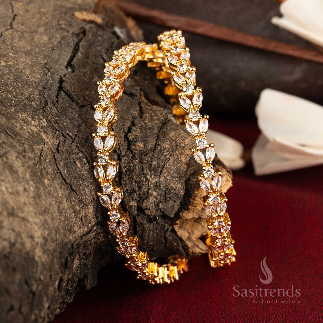 Charming micro gold plated American diamond bangles featuring a delicate floral leaf design, beautifully crafted in a radiant white hue, ideal for elegant and timeless jewellery - Sasitrends