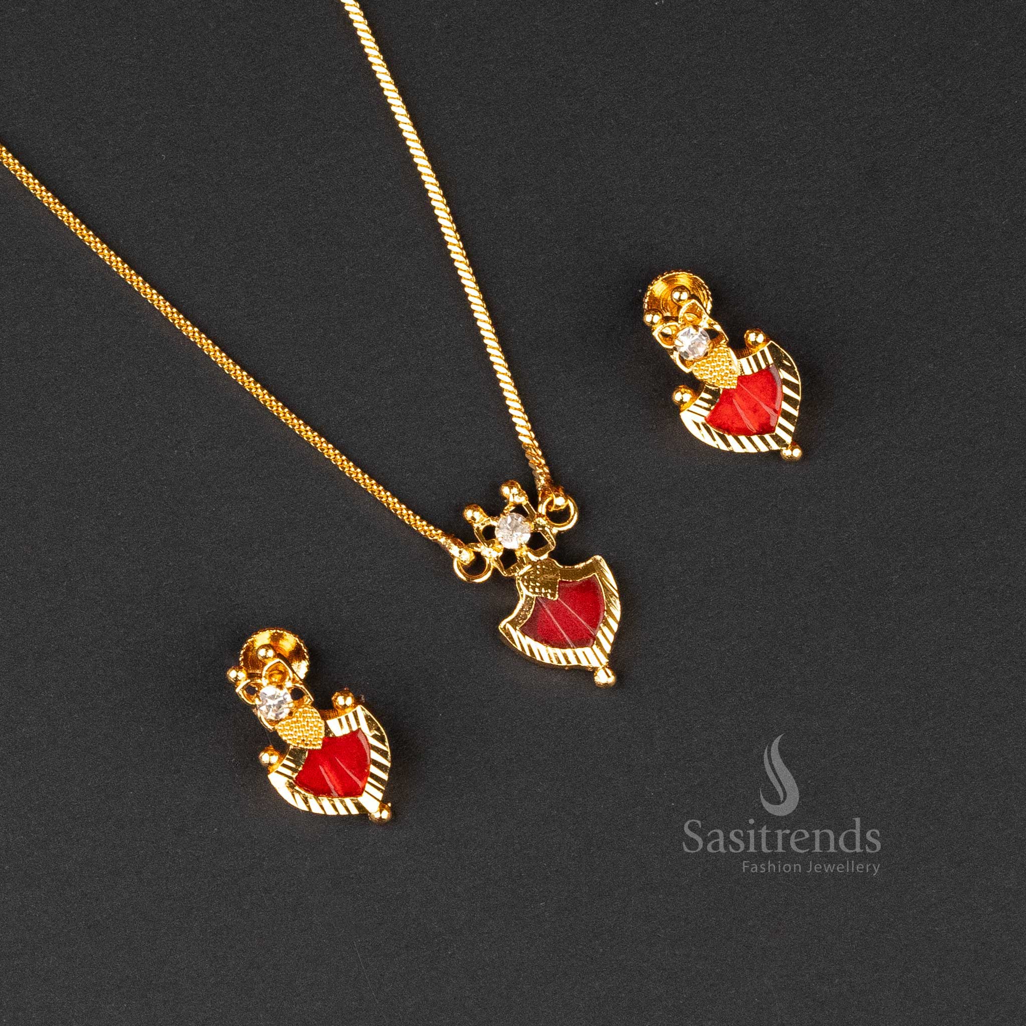 Raditional Palakka pendant jewellery set adorned with red stones and a micro gold finish - Sasitrends