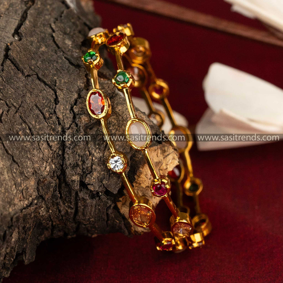 Elegant matte gold-plated AD bangles with oval and round stones Sasitrends Online Shopping