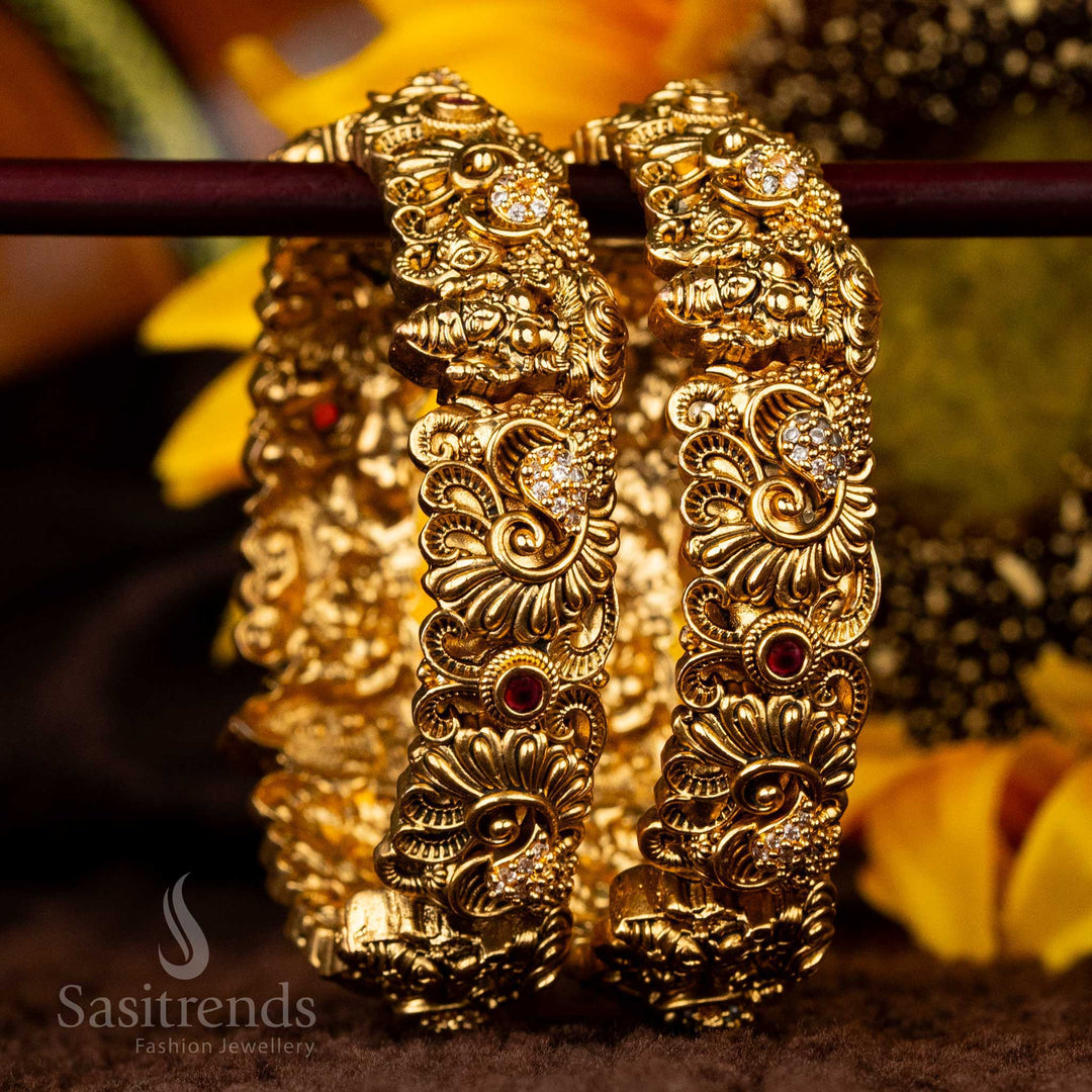 Temple bangles with Lakshmi motifs and American diamonds for weddings - Sasitrends