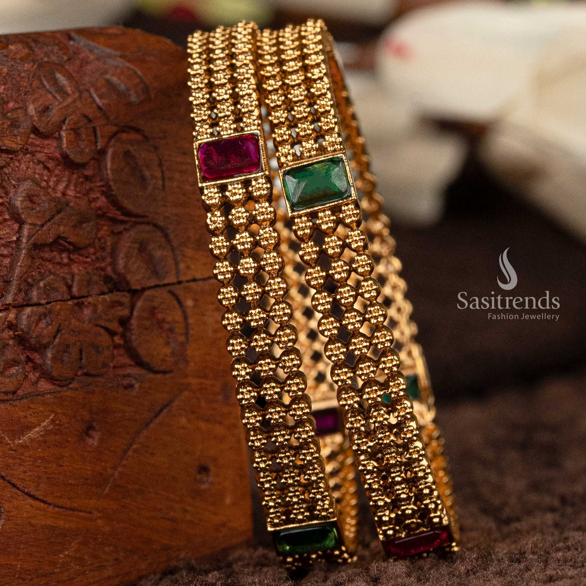 Exquisite temple bridal bangles adorned with ruby and green stones - Sasitrends