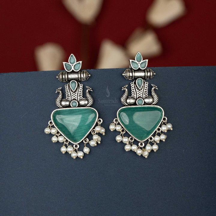 Elegant Oxidised Silver Earrings with Vibrant Cabochon Stones, Peacock Motif, and Pearl Hangings - Sasitrends