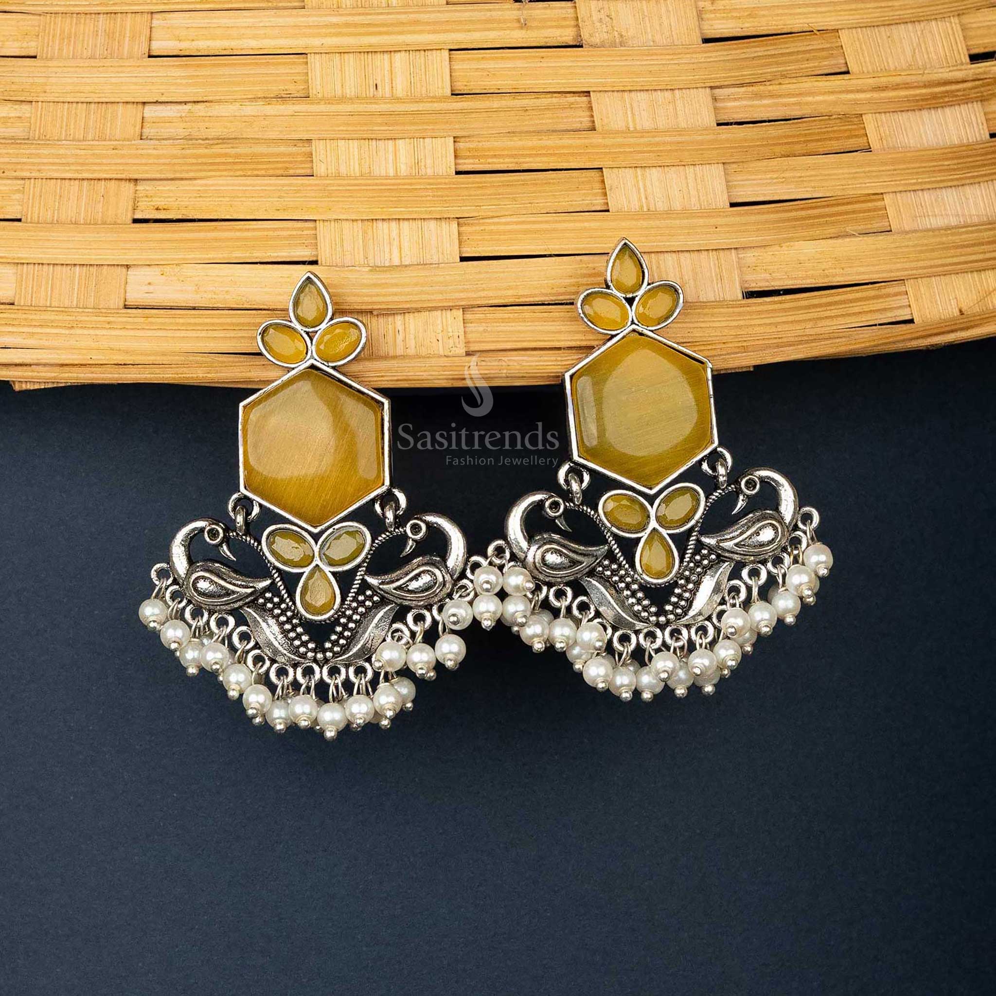 Oxidised Yellow Earrings with Peacock Design and Pearls for Festive Occasions