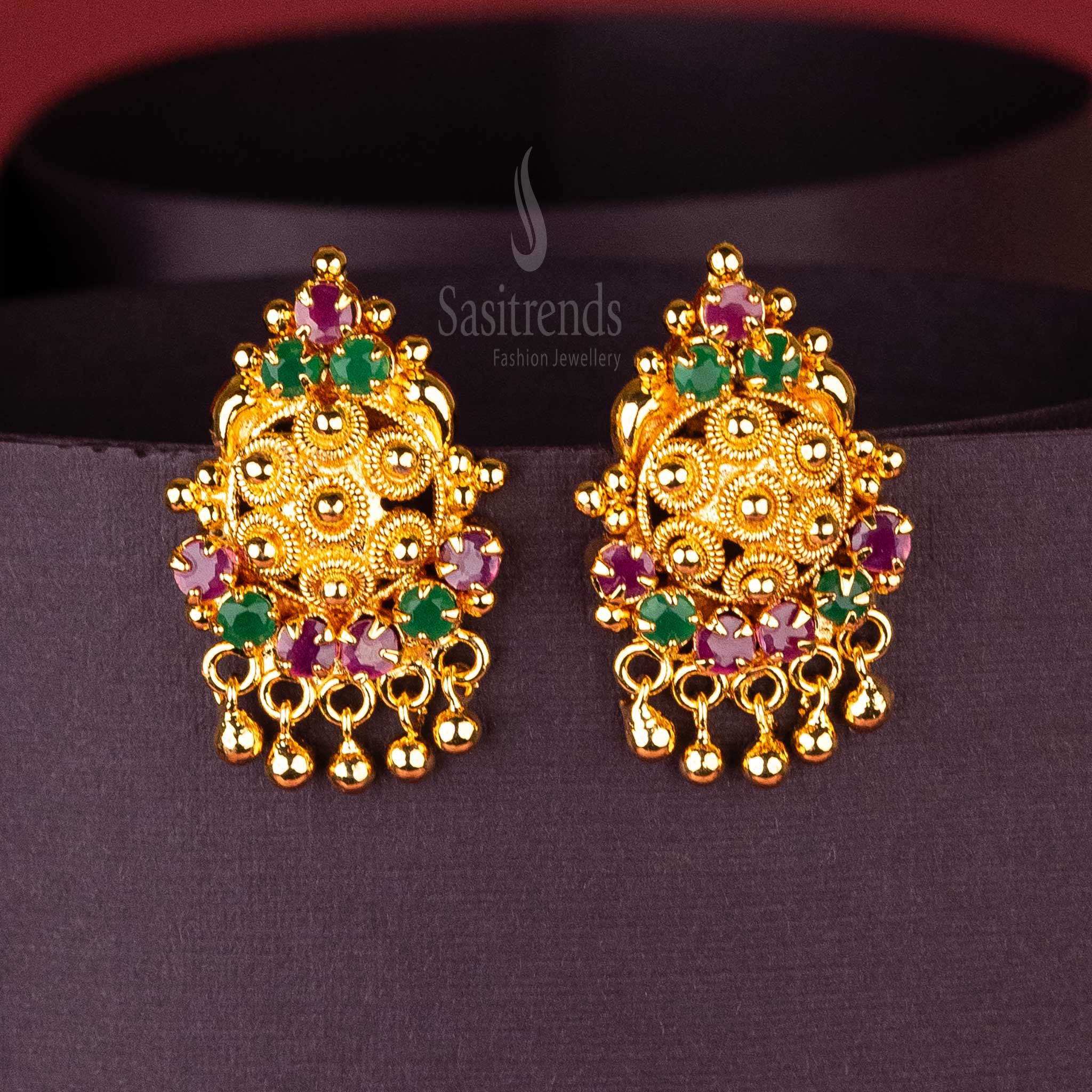 Round floral stud earrings with green and ruby stones, gold plating