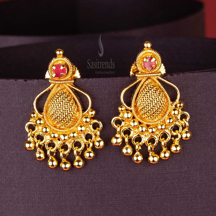 Sophisticated Ruby Teardrop Mesh Earrings in Gold Plated Finish with AD Stone and Hanging Golden Balls – Traditional Jewellery Design