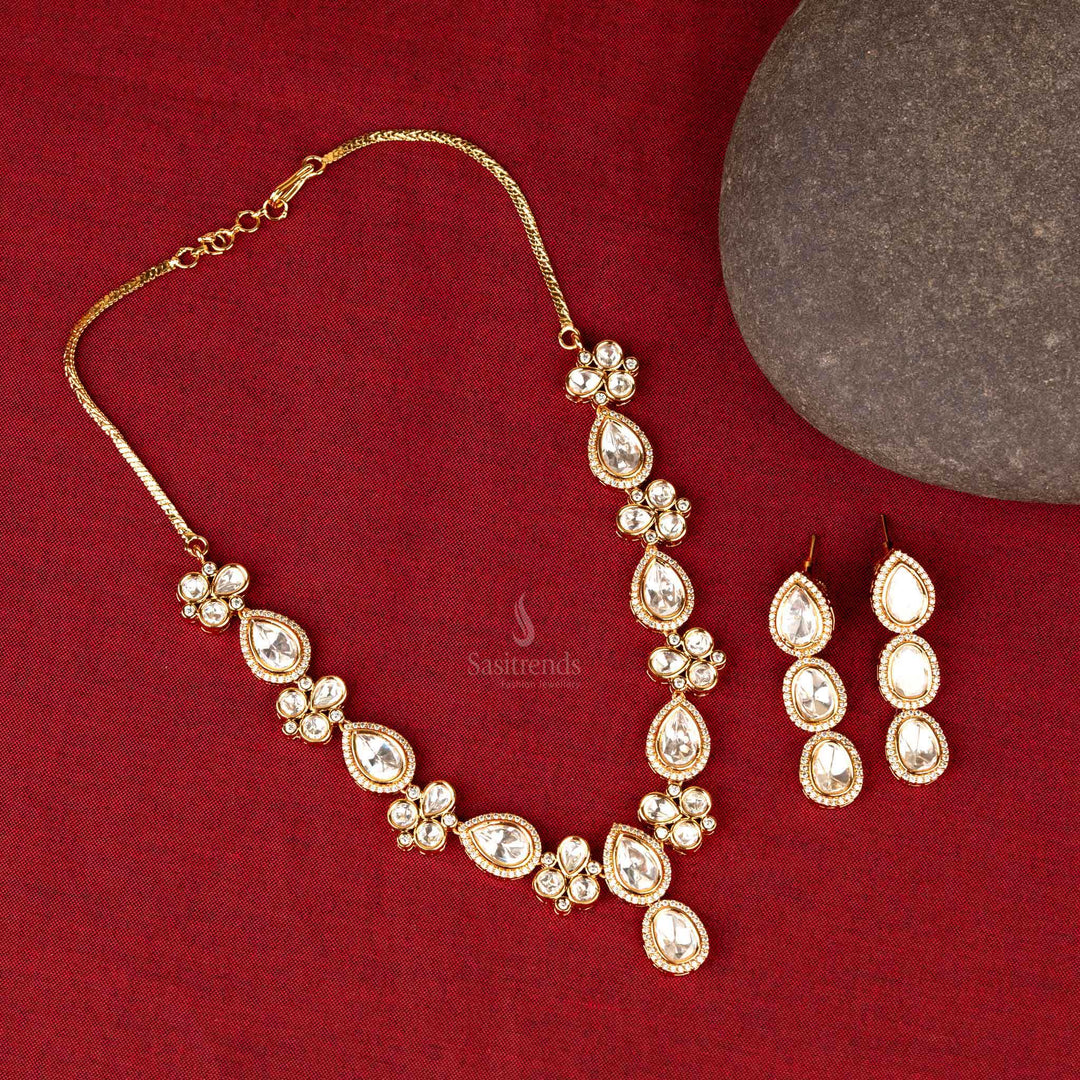 High gold plated necklace with floral motifs and Kundan stones Sasitrends