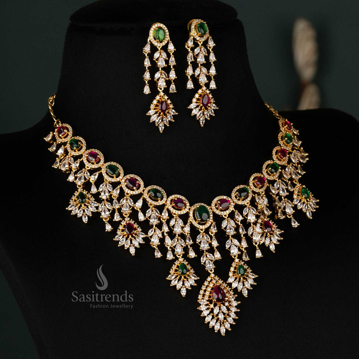 Stunning ruby and green gold-plated necklace set embellished with American diamonds, ideal for bridal fashion and party outfits - Sasitrends