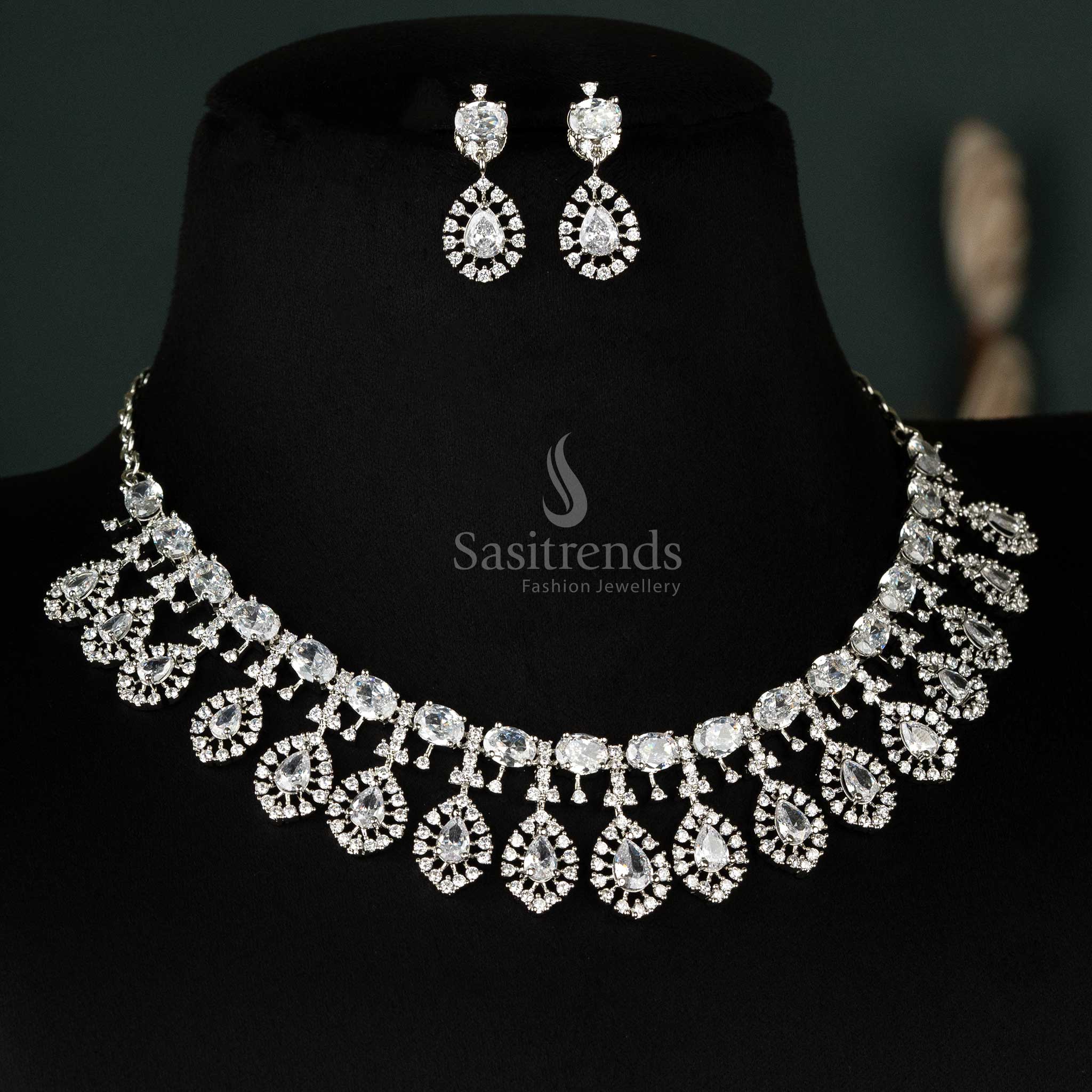 Elegant white choker set featuring a classic teardrop design, enhanced with rhodium silver-plating and sparkling American diamonds - Sasitrends