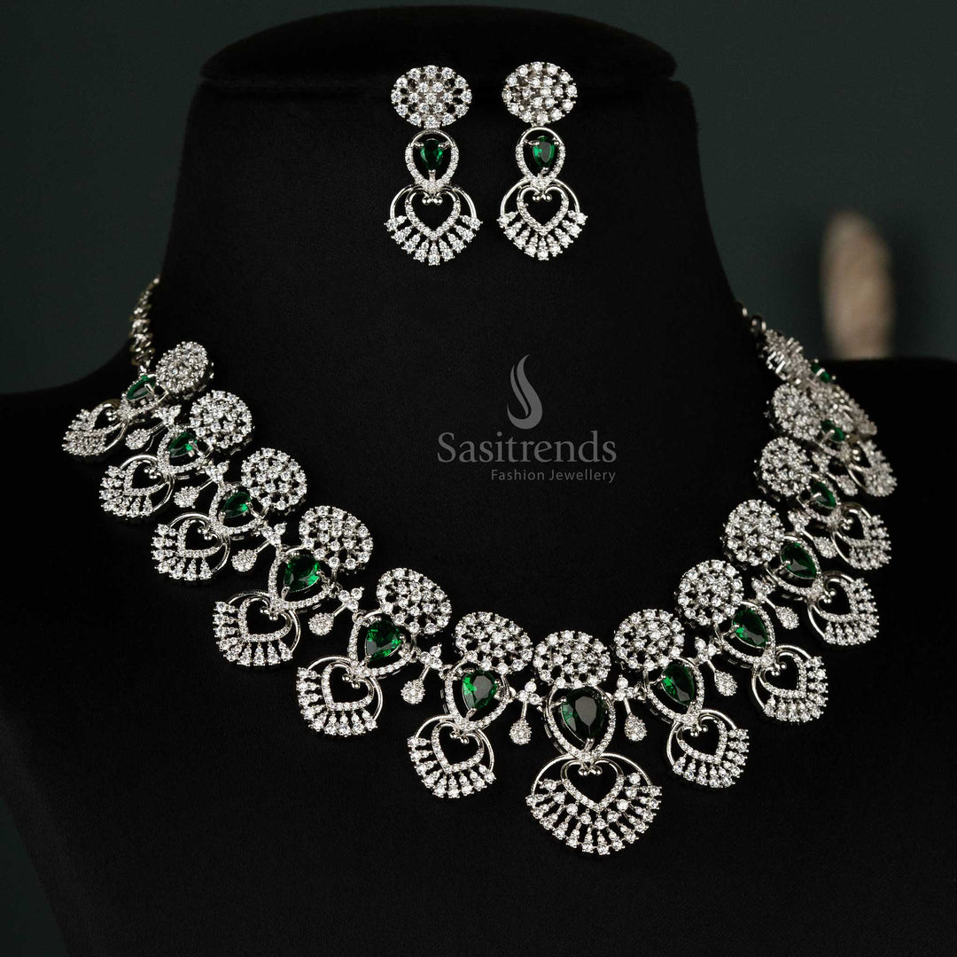 Elegant choker set featuring a heart motif in vibrant green, adorned with sparkling American diamonds and rhodium silver-plating - Sasitreds