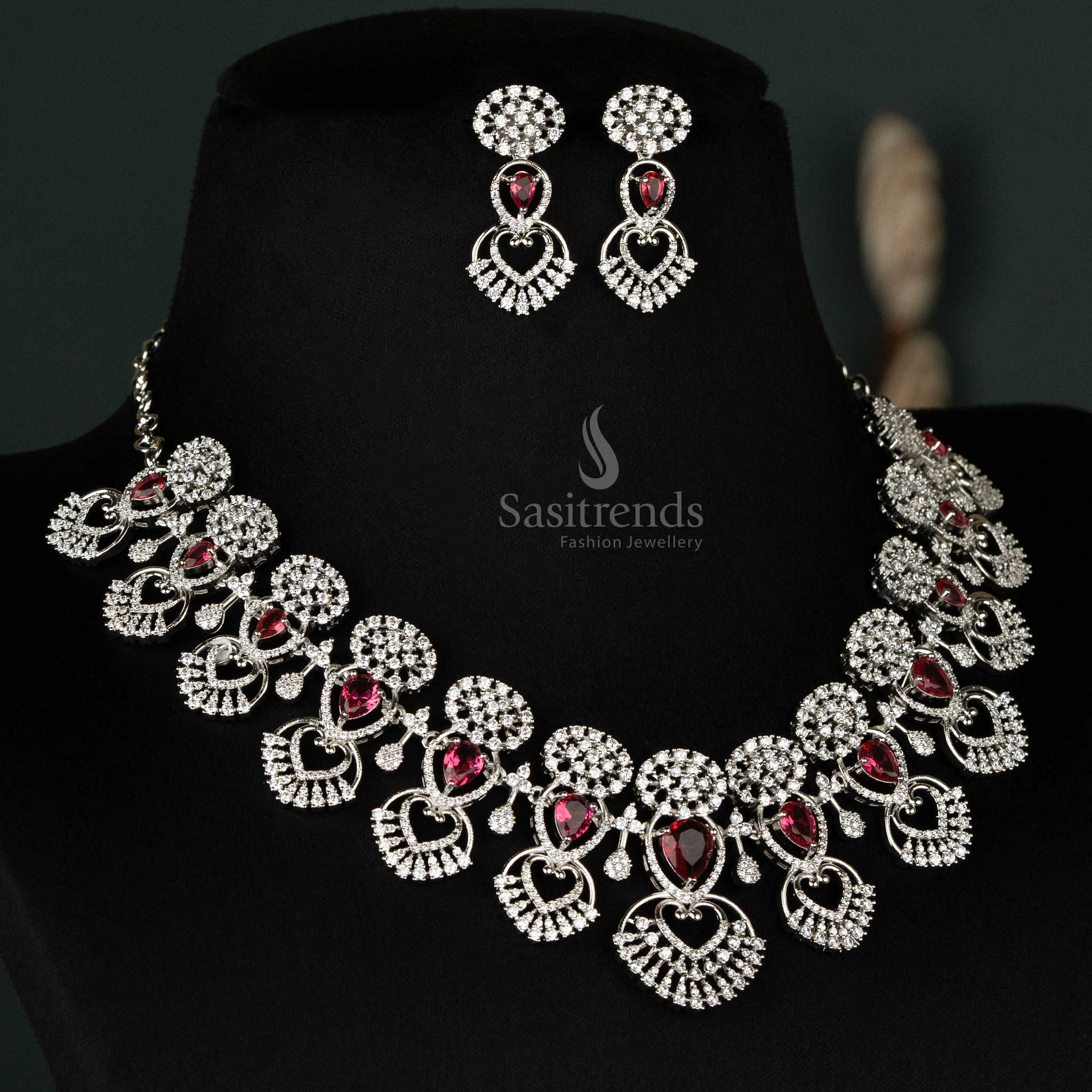 Stunning red choker set crafted with a heart-shaped pattern, sparkling American diamonds, and rhodium silver-plating - Sasitrends