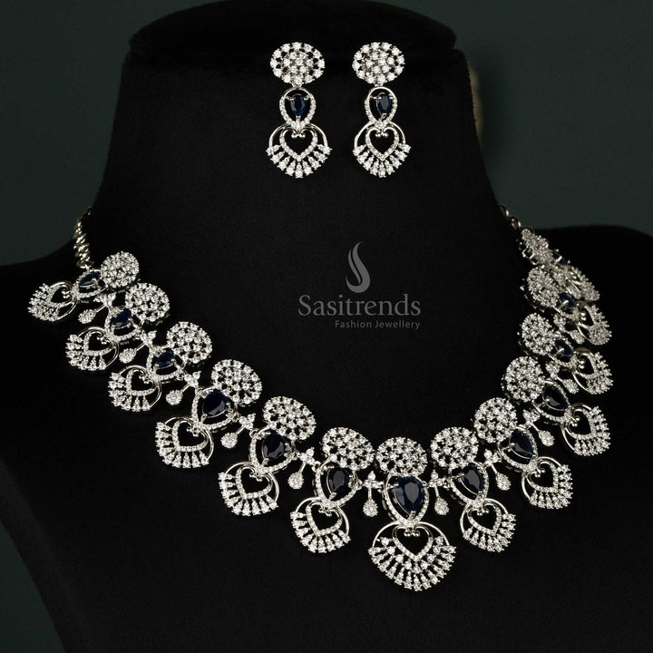 Striking blue choker set showcasing a heart design, embellished with American diamonds and a luxurious rhodium silver finish - Sasitrends