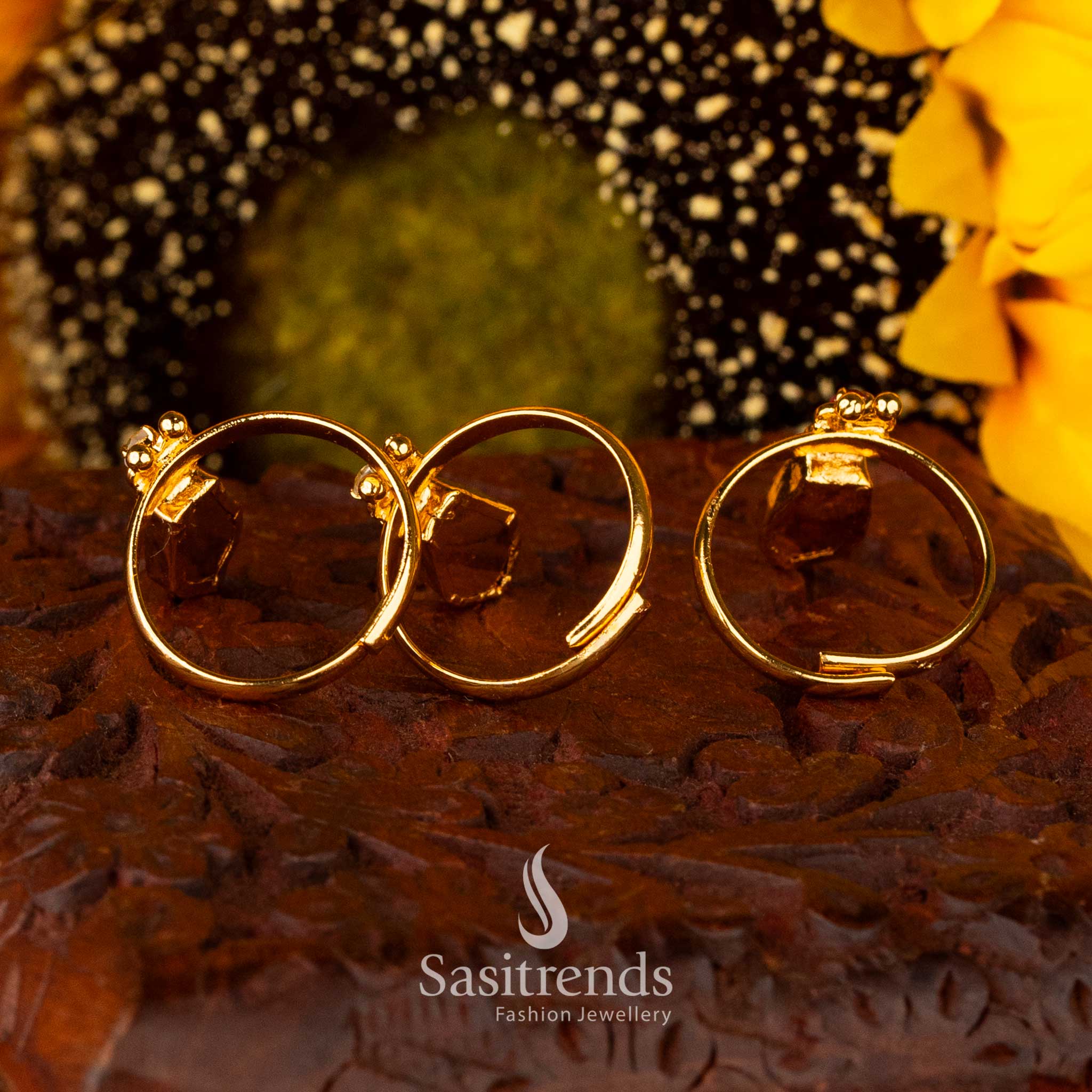 Detailed back view of Sasitrends micro gold-plated nagapadam palakka rings