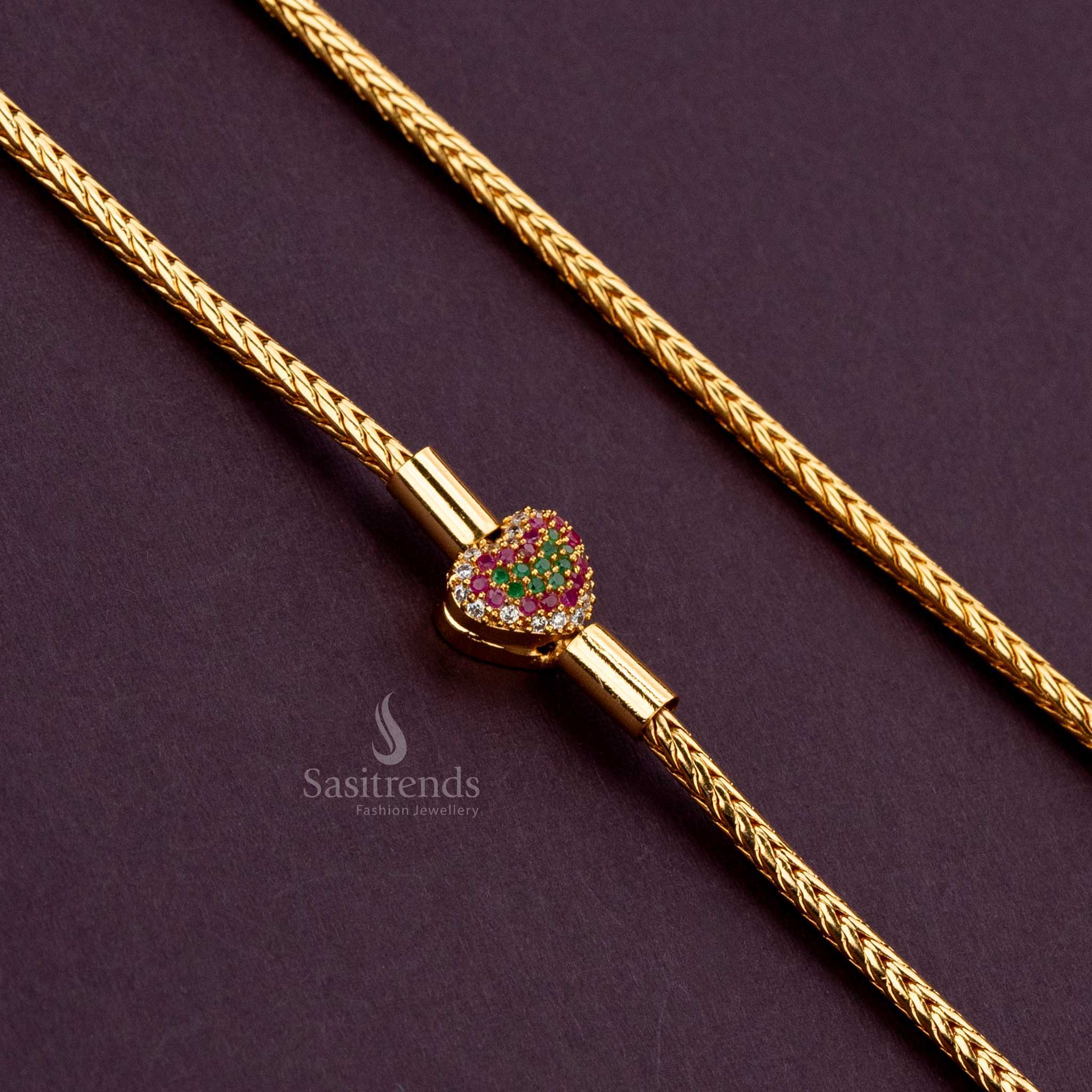 Elegant mugappu chain With Multi Color AD Stone showcasing intricate heart design and luxury - Sasitrends