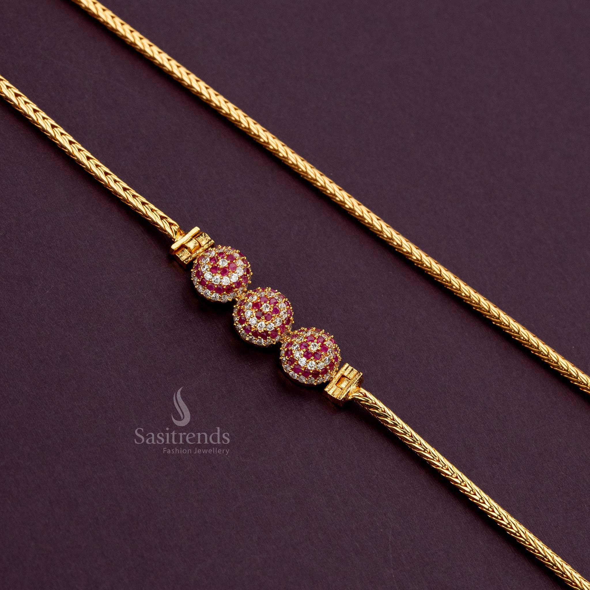 Micro gold-plated mugappu chain with white and ruby AD stones for a premium gold-like finish - Sasitrends